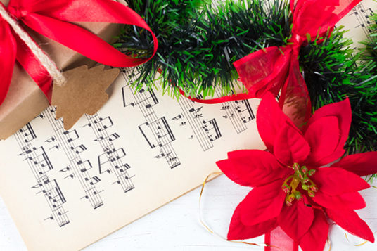 A holiday-themed image suggesting effortless, feel-good holiday songs for any playlist
